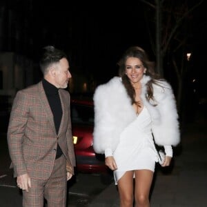 Liz Hurley et David Furnish à la sortie de la soirée "Evgeny's Annual Vodka & Caviar Party" à Londres, le 7 décembre 2018.