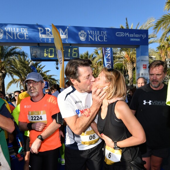 Christian Estrosi, le maire de Nice, et sa femme Laura Tenoudji participent à la 20eme édition de la Prom'Classic, une course à pied de 10kms sur la Promenade des Anglais à Nice le 6 janvier 2019. © Bruno Bebert / Bestimage