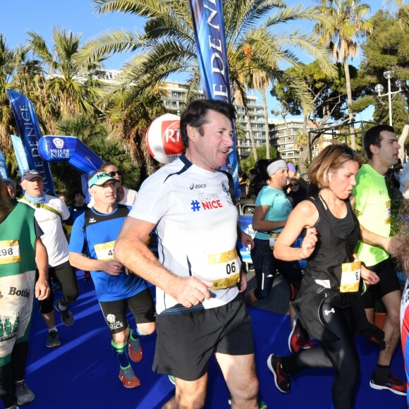 Christian Estrosi, le maire de Nice, et sa femme Laura Tenoudji participent à la 20eme édition de la Prom'Classic, une course à pied de 10kms sur la Promenade des Anglais à Nice le 6 janvier 2019. © Bruno Bebert / Bestimage