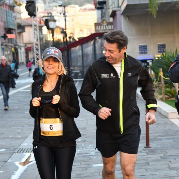 Christian Estrosi, le maire de Nice, et sa femme Laura Tenoudji participent à la 20eme édition de la Prom'Classic, une course à pied de 10kms sur la Promenade des Anglais à Nice le 6 janvier 2019. © Bruno Bebert / Bestimage