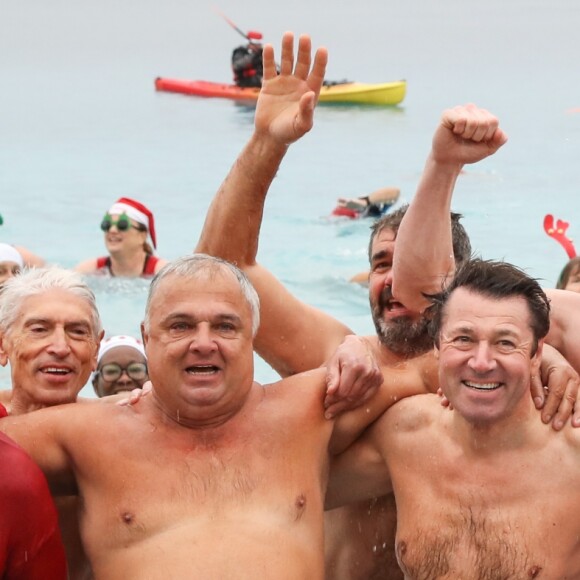 Christian Estrosi, le maire de Nice, a participé au 74ème traditionnel bain de Noel à Nice, le 16 décembre 2018. Avec un ciel gris et pluvieux et une température de l'eau à 17 degrés, une cinquantaine de nageurs se sont jetés à l'eau dans la Baie des Anges alors que la température extèrieure était de 9 degrés. © Bruno Bebert/Bestimage