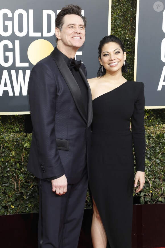 Jim Carrey et sa compagne Ginger Gonzaga au photocall de la 76ème cérémonie annuelle des Golden Globe Awards au Beverly Hilton Hotel à Los Angeles, Californie, Etats-Unis, le 6 janvier 2019.