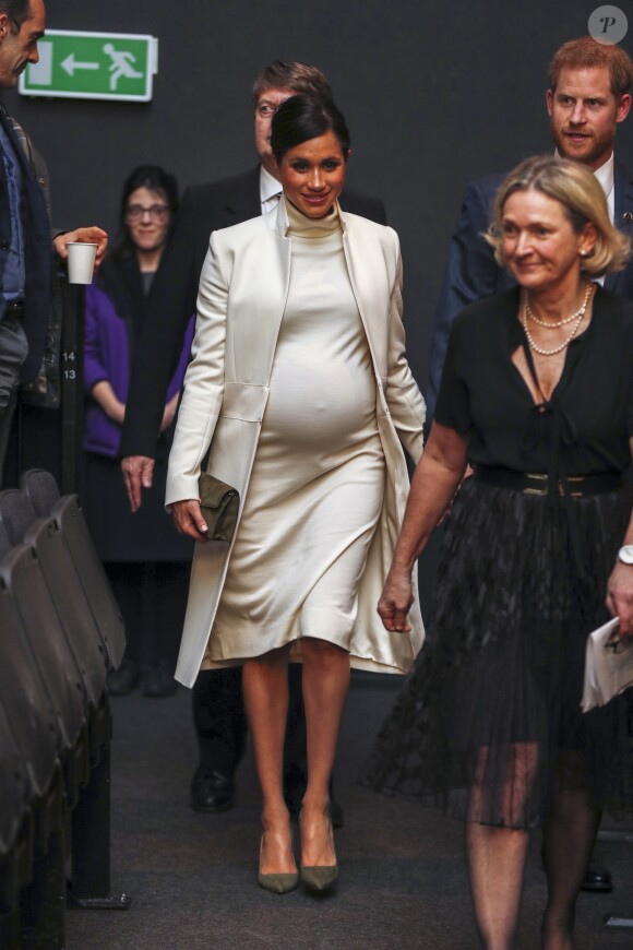 Le prince Harry, duc de Sussex, et Meghan Markle, duchesse de Sussex, enceinte, arrivent au musée d'histoire naturelle pour assister à la soirée de gala The Wider Earth à Londres le 12 février 2019.