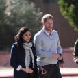 Le prince Harry, duc de Sussex et Meghan Markle (enceinte), duchesse de Sussex en visite dans un pensionnat à Asli lors de leur voyage officiel au Maroc. Le 24 février 2019