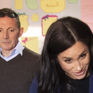 Le prince Harry, duc de Sussex, et Meghan Markle, duchesse de Sussex, enceinte, visitent un pensionnat de jeunes filles à Asni dans le cadre de leur voyage officiel au Maroc, le 24 février 2019.