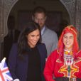 Le prince Harry, duc de Sussex, et Meghan Markle, duchesse de Sussex, enceinte, visitent un pensionnat de jeunes filles à Asni dans le cadre de leur voyage officiel au Maroc, le 24 février 2019.