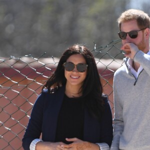 Le prince Harry, duc de Sussex, et Meghan Markle, duchesse de Sussex, enceinte, visitent le "Lycée Qualifiant Grand Atlas" dans le cadre de leur voyage officiel au Maroc, le 24 février 2019.