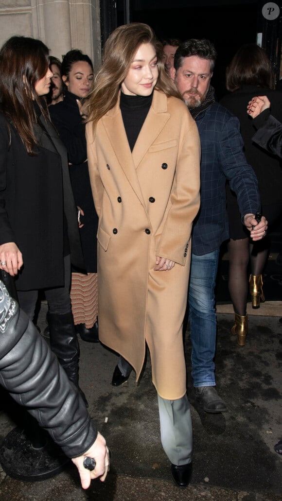 Gigi Hadid à la sortie de la soirée "La Nuit by Sofitel" au Pavillon Cambon à Paris, le 28 février 2019.