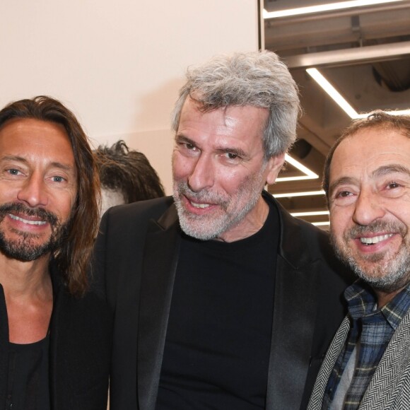 Bob Sinclar, Stéphane de Bourgies et Patrick Timsit - Vernissage de l'exposition "Quand le masque tombe" de Stéphane de Bourgies sur le toit de la Grande Arche de la Défense, le 12 mars 2019.© Coadic Guirec/Bestimage