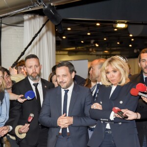 La Première Dame Brigitte Macron, avec son directeur de cabinet Pierre-Olivier Costa et le secrétaire d'État auprès de la ministre des Solidarités et de la Santé, Adrien Taquet lors au "Grand débat national pour les enfants", à la Cité des sciences et de l'industrie à Paris, France, le 20 mars 2019.