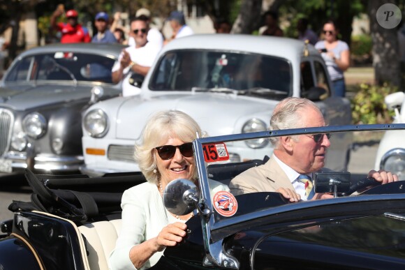 Camilla Parker Bowles, duchesse de Cornouailles, et le prince Charles dans une MG 1953 lors d'un défilé de voitures anciennes à La Havane à Cuba, le 26 mars 2019.
