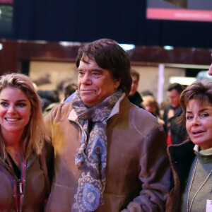 Bernard Tapie avec sa femme Dominique, sa fille sophie Tapie et son compagnon Raphaël Goehrs - Dans le cadre du Gucci Paris Masters a eu lieu l'epreuve "Style & Competition for AMADE" a Villepinte le 7 décembre 2013.