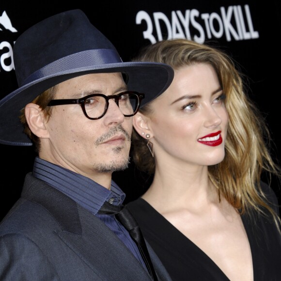 Johnny Depp et sa fiancée Amber Heard - Première du film "3 Days to Kill" à Hollywood, le 12 février 2014.