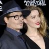 Johnny Depp et sa fiancée Amber Heard - Première du film "3 Days to Kill" à Hollywood, le 12 février 2014.12/02/2014 - Hollywood