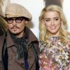 Johnny Depp et Amber Heard au photocall du film "Rhum Express" à Paris Photocall en 2011
