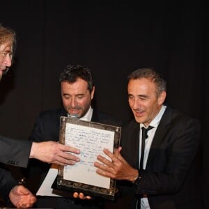 Stéphane Bolongaro, Bernard Montiel et Elie Semoun - "Grace Kelly 90 Years", exposition hommage à la princesse Grace de Monaco pour le 90ème anniversaire de sa naissance au Musée des Collections des voitures princières à Monaco le 18 avril 2019. L'artiste plasticien niçois Stéphane Bolongaro a investi le Musée des Collections des voitures princières à Fontvieille, avec une cinquantaine d'oeuvres de peintres et plasticiens à qui il a demandé de créer spécialement une oeuvre en hommage à la Princesse Grace. L'exposition était une surprise pour le prince. L'exposition sera ensuite ouverte au public pendant 15 jours et voyagera ensuite vers différents états des Etats-Unis demandeurs de cet hommage. - "Grace Kelly 90 Years", exposition hommage à la princesse Grace de Monaco pour le 90ème anniversaire de sa naissance au Musée des Collections des voitures princières à Monaco le 18 avril 2019. L'artiste plasticien niçois Stéphane Bolongaro a investi le Musée des Collections des voitures princières à Fontvieille, avec une cinquantaine d'oeuvres de peintres et plasticiens à qui il a demandé de créer spécialement une oeuvre en hommage à la Princesse Grace. L'exposition était une surprise pour le prince. L'exposition sera ensuite ouverte au public pendant 15 jours et voyagera ensuite vers différents états des Etats-Unis demandeurs de cet hommage. © Bruno Bebert/Bestimage