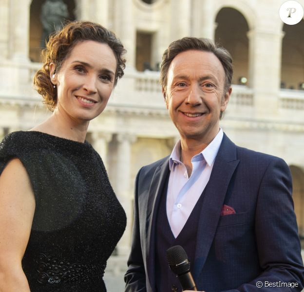 Exclusif - Marie-Sophie Lacarrau et Stéphane Bern - Soirée spéciale " Notre Dame de Paris, Le Grand Concert " qui s'est déroulée dans la Cour des Invalides à Paris 7eme et diffusée sur France 2 samedi 20 Avril 2019. Au programme de ce concert de solidarité, animé par S. Bern et M.S. Lacarrau : une pléiade d'artistes qui interpréteront des chansons inspirées de la Ville Lumière et de la comédie musicale " Notre-Dame de Paris ".De grands noms de la chanson se mélangeront à des figures du classique.Des reportages consacrés à l'histoire de la cathédrale ponctueront leurs prestations, de même que les interventions des habitués de Notre-Dame. Les téléspectateurs qui le souhaitent pourront faire un don par Internet. © Pierre Perusseau / Bestimage
