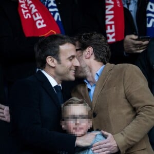 Le président Emmanuel Macron avec son frère Laurent Macron et ses neveux Louis et Paul-Arthur Macron lors de la victoire du Stade Rennais (2-2, 6-5 aux t.a.b.) en finale de la Coupe de France contre le PSG le 27 avril 2019 au Stade de France.