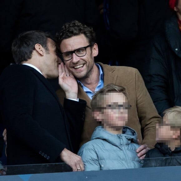 Le président Emmanuel Macron avec son frère Laurent Macron et ses neveux Louis et Paul-Arthur Macron lors de la victoire du Stade Rennais (2-2, 6-5 aux t.a.b.) en finale de la Coupe de France contre le PSG le 27 avril 2019 au Stade de France.