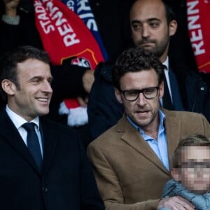 Le président Emmanuel Macron avec son frère Laurent Macron et ses neveux Louis et Paul-Arthur Macron lors de la victoire du Stade Rennais (2-2, 6-5 aux t.a.b.) en finale de la Coupe de France contre le PSG le 27 avril 2019 au Stade de France.