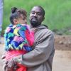 K. Kardashian et Kanye West arrivent avec leur fille North West à la messe dominicale à Los Angeles. La petite North semble faire un caprice et demande à son papa de la porter... K. porte un trench XXL. Le 10 mars 2019
