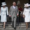 Le prince Charles, prince de Galles, et Camilla Parker Bowles, duchesse de Cornouailles, et la princesse Anne lors de la garden-party annuelle de Buckingham Palace. Londres, le 15 mai 2019.