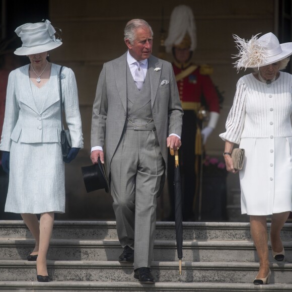 Le prince Charles, prince de Galles, et Camilla Parker Bowles, duchesse de Cornouailles, et la princesse Anne lors de la garden-party annuelle de Buckingham Palace. Londres, le 15 mai 2019.
