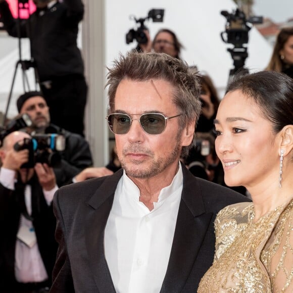 Jean-Michel Jarre et sa compagne Gong Li lors de la montée des marches du film "Douleur et Gloire" lors du 72ème Festival International du Film de Cannes. Le 17 mai 2019 © Jacovides-Moreau / Bestimage