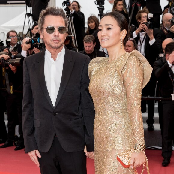 Jean-Michel Jarre et sa compagne Gong Li lors de la montée des marches du film "Douleur et Gloire" lors du 72ème Festival International du Film de Cannes. Le 17 mai 2019 © Jacovides-Moreau / Bestimage