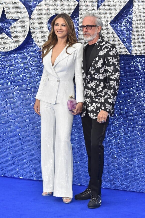 Elizabeth Hurley (Liz Hurley) et son ami Patrick Cox à la première du film "Rocketman" au cinéma Odeon Leicester Square à Londres, Royaume Uni, le 20 mai 2019.