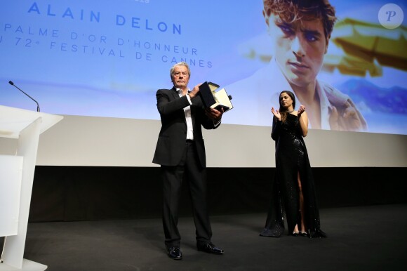 Alain Delon et sa fille Anouchka (Robe Elie Saab) - Remise de la Palme d'Honneur à Alain Delon lors du 72ème Festival International du Film de Cannes. On may 19th 2019 © Jacovides-Moreau / Bestimage