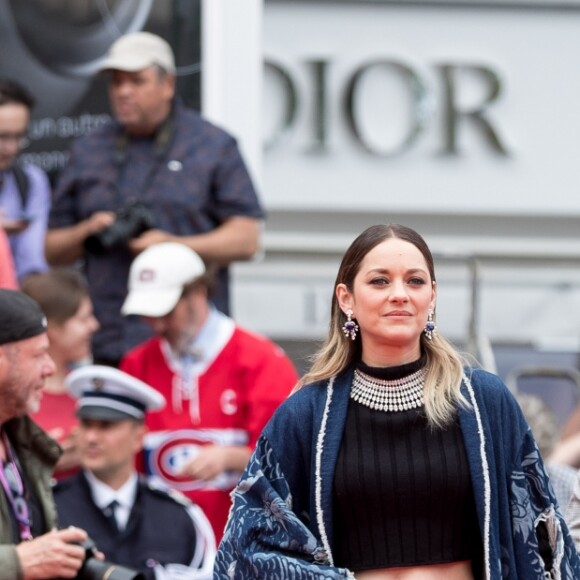 Marion Cotillard (tenue Balmain) - Montée des marches du film " Matthias et Maxime "  lors du 72ème Festival International du Film de Cannes, le 22 mai 2019. © Jacovides-Moreau / Bestimage