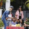 Laeticia Hallyday, ses filles Jade et Joy, deux amies d'école et Maryline Issartier - Les filles de L.Hallyday et deux amies d'école vendent de la limonade pour collecter des fonds pour l'association de leur mère au Vietnam, devant la villa de Pacific Palisades, Los Angeles, Californie Etats-Unis, le 18 mai 2019.