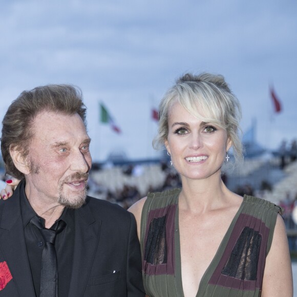 Johnny Hallyday et sa femme Laeticia Hallyday - Longines Paris Eiffel Jumping à la plaine de Jeux de Bagatelle à Paris le 1er juillet 2016. © Olivier Borde / Veeren / Bestimage