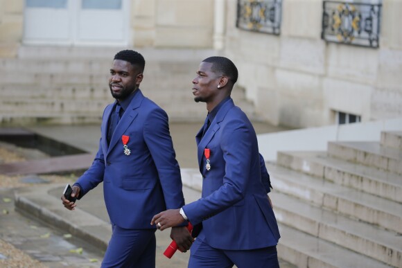 Samuel Umtiti - Paul Pogba - Les membres de l'équipe de France de football quittent le palais de l'Elysée après la remise de la légion d'honneur par le président de la République à Paris, France, le 4 juin 2019. © Stephen Caillet/Panoramic/Bestimage