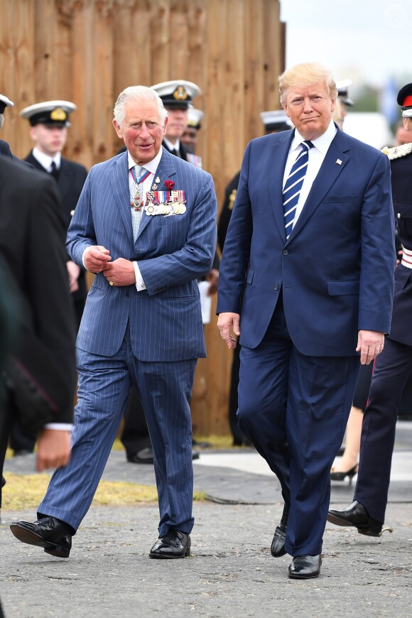 Le prince Charles et le président des Etats-Unis Donald Trump - Rencontre avec des vétérans lors de la cérémonie à Portsmouth pour le 75ème anniversaire du débarquement en Normandie pendant la Seconde Guerre Mondiale. Le 5 juin 2019