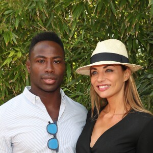 Ariane Brodier et son compagnon Fulgence Ouedraogo au village lors des internationaux de tennis de Roland Garros à Paris le 5 juin 2017. © Cyril Moreau / Dominique Jacovides / Bestimage