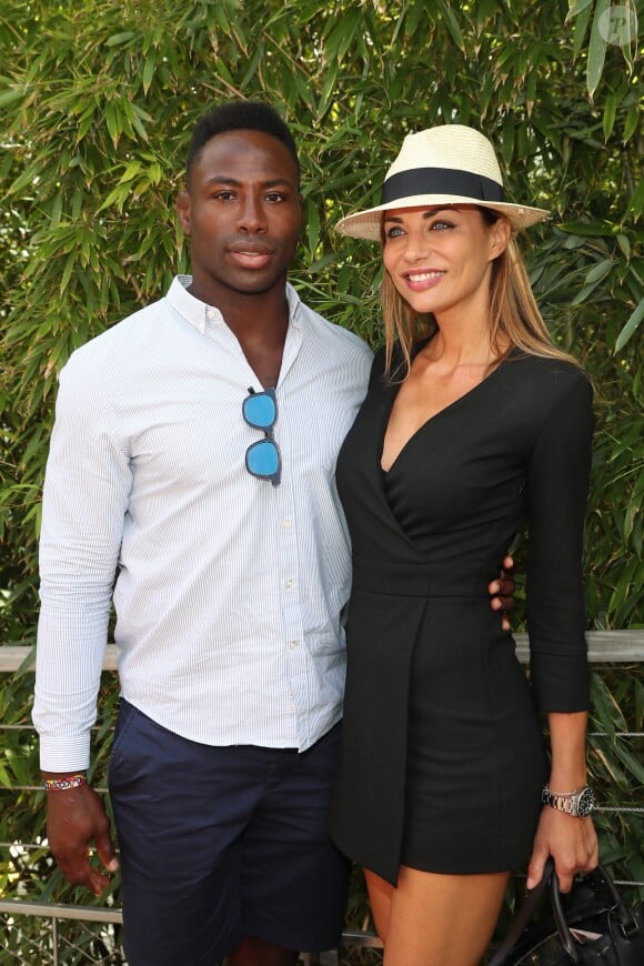 Ariane Brodier et son compagnon Fulgence Ouedraogo au village lors des internationaux de tennis de Roland Garros à Paris le 5 juin 2017. © Cyril Moreau / Dominique Jacovides / Bestimage