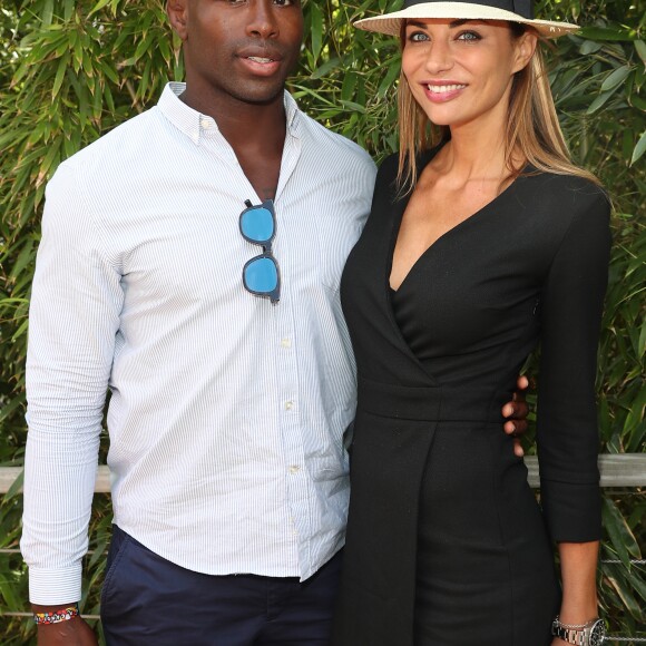 Ariane Brodier et son compagnon Fulgence Ouedraogo au village lors des internationaux de tennis de Roland Garros à Paris le 5 juin 2017. © Cyril Moreau / Dominique Jacovides / Bestimage