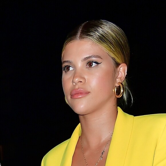 Sofia Richie porte un ensemble jaune à la sortie de la soirée "Fenty Pop" au restaurant Cipriani à New York, le 18 juin 2019.  New York, NY - Sofia Richie rocks sophisticated yellow pant suit by Fenty at Cipriani this evening after the launch of Rihanna's Fenty pop up. on June 18th 201918/06/2019 - New York