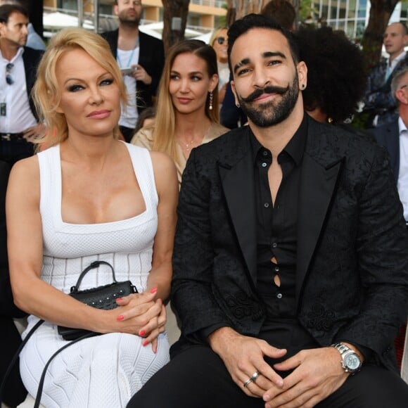 Pamela Anderson et Adil Rami lors de la soirée Amber Lounge Monaco 2019 au profit de la fondation de Jackie Stewart "Race Against Dementia" à l'hôtel Méridien Beach Plaza à Monaco, le 24 mai 2019. © Bruno Bebert / Bestimage