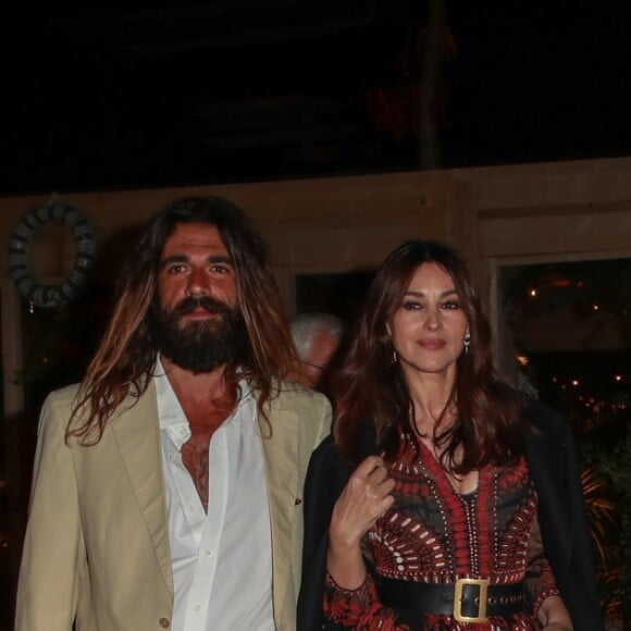 Monica Bellucci (habillée en Dior) et son compagnon Nicolas Lefebvre - People à la sortie de la soirée "Dior Vogue" chez "Fred l'écailler" lors du 72ème Festival International du Film de Cannes, le 15 mai 2019.