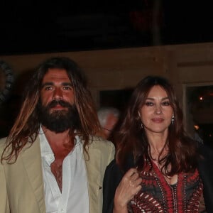 Monica Bellucci (habillée en Dior) et son compagnon Nicolas Lefebvre - People à la sortie de la soirée "Dior Vogue" chez "Fred l'écailler" lors du 72ème Festival International du Film de Cannes, le 15 mai 2019.