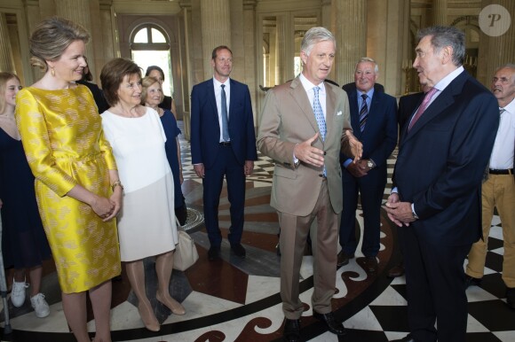 Le roi Philippe de Belgique et sa femme la reine Mathilde de Belgique ont reçu le champion Eddy Merckx et sa famille à l'occasion du 50ème anniversaire de sa première victoire dans le Tour de France le 5 juillet 2019 au château de Laeken à Bruxelles à la veille du départ du Tour 2019.