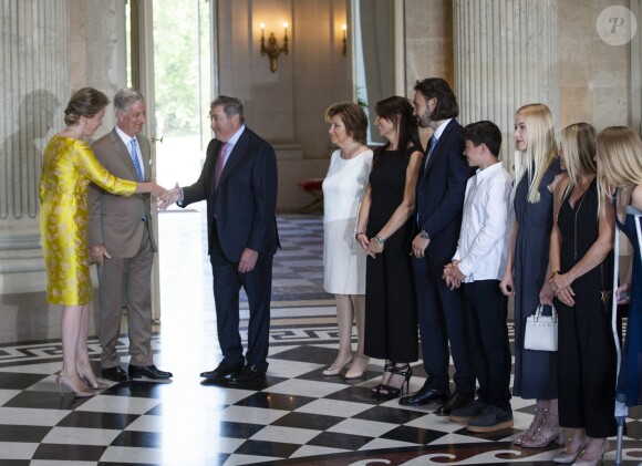 Le roi Philippe de Belgique et sa femme la reine Mathilde de Belgique ont reçu le champion Eddy Merckx et sa famille à l'occasion du 50ème anniversaire de sa première victoire dans le Tour de France le 5 juillet 2019 au château de Laeken à Bruxelles à la veille du départ du Tour 2019.