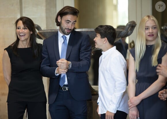 Le roi Philippe de Belgique et sa femme la reine Mathilde de Belgique ont reçu le champion Eddy Merckx et sa famille à l'occasion du 50ème anniversaire de sa première victoire dans le Tour de France le 5 juillet 2019 au château de Laeken à Bruxelles à la veille du départ du Tour 2019.