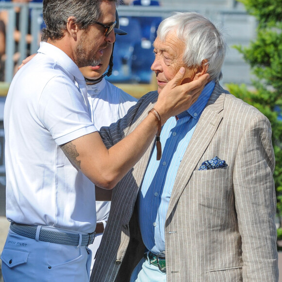 Guillaume Canet, son père Philippe et Paloma de Crozals pendant la reconnaissance du Prix Geberit en faveur de l'association Ela lors du Longines Paris Eiffel Jumping au Champ de Mars à Paris, France, le premier 7 juillet 2019. © Pierre Perusseau/Bestimage