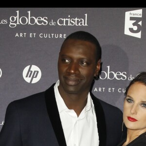 Omar et hélène Sy soirée des Globes de Cristal au Lido à Paris, le 6 février 2012.