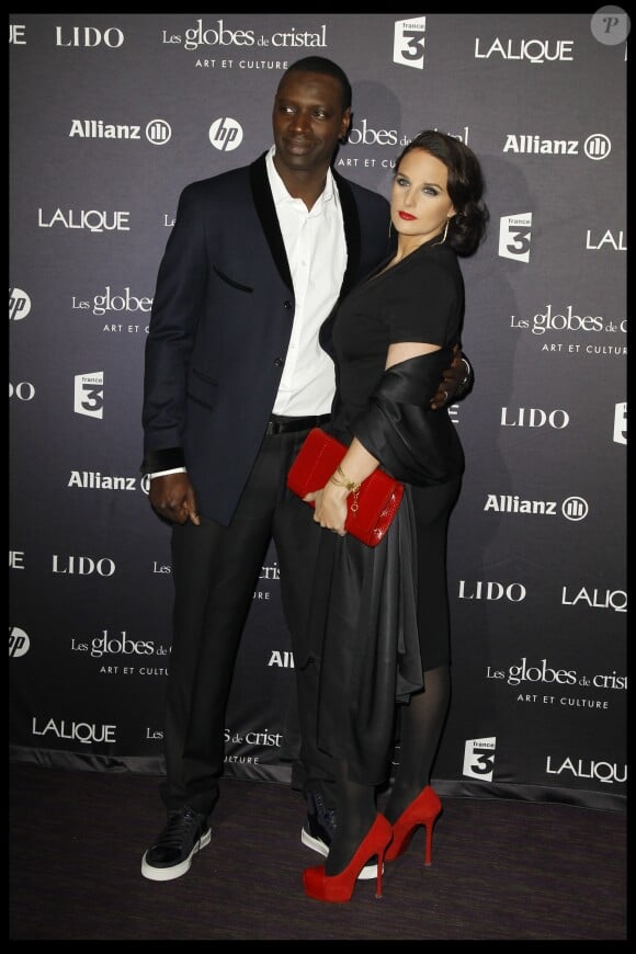 Omar et hélène Sy soirée des Globes de Cristal au Lido à Paris, le 6 février 2012.
