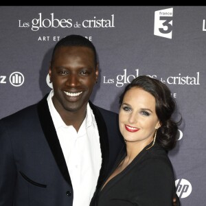 Omar et hélène Sy soirée des Globes de Cristal au Lido à Paris, le 6 février 2012.